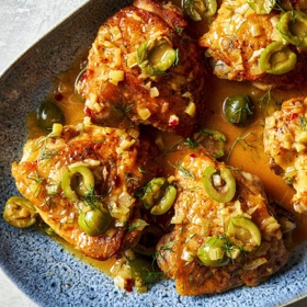Braised Chicken Thighs with Fennel, Orange, and Cracked Olives