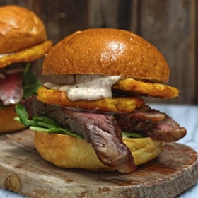 Ribeye Steak Sandwich with Tostones and Jerk Mayo