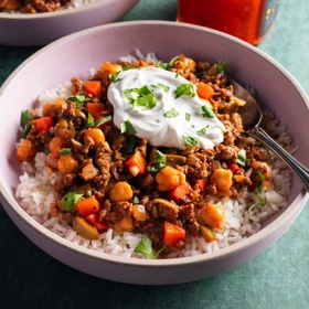 Rice Bowls with Harissa Beef, Chickpeas, and Olives
