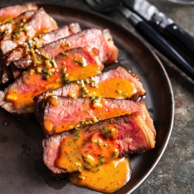 Reverse-Seared Strip Steaks with Cowboy Butter
