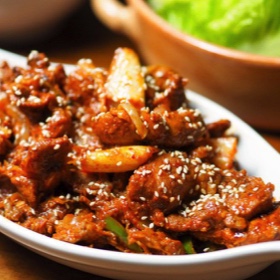 Jaeyook Kimchi Bokum (Korean Spicy Marinated Pork with Chiles and Kimchi)