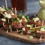 Sausage Cheese Shishito Skewers with Creamy Basil Honey Mustard