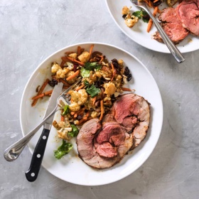 Harissa-Rubbed Roast Boneless Leg of Lamb with Warm Cauliflower Salad