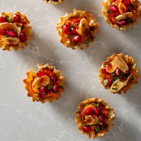 Butternut Squash Tartlets with Almonds, Pomegranate, and Mint