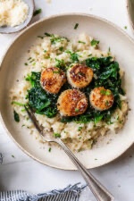 Scallops Over Wilted Spinach Parmesan Risotto