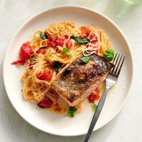 Salmon with Garlic Butter and Tomato Pasta